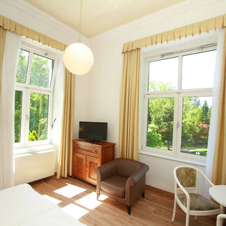 Doppelzimmer in der Villa mit Kurparkblick